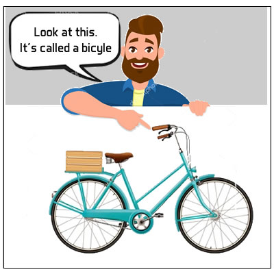 man pointing a bicyle